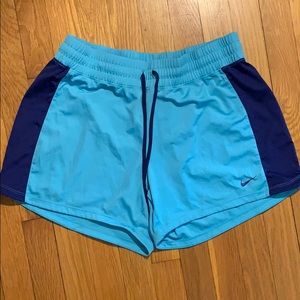 Blue Nike athletic shorts